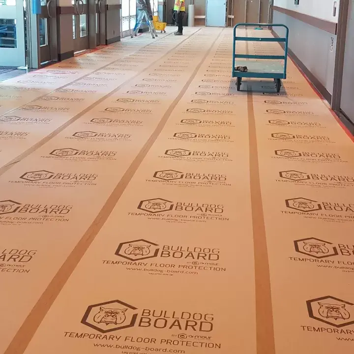 Image of Bulldog Board for jobsite floor protection Bulldog Board price vs quality blog by Axiom, supplier to Canada/ North America construction professionals