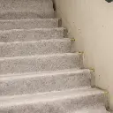 Armour-Pro-Tack-Felt-In-Use-On-Stairs-3.webp