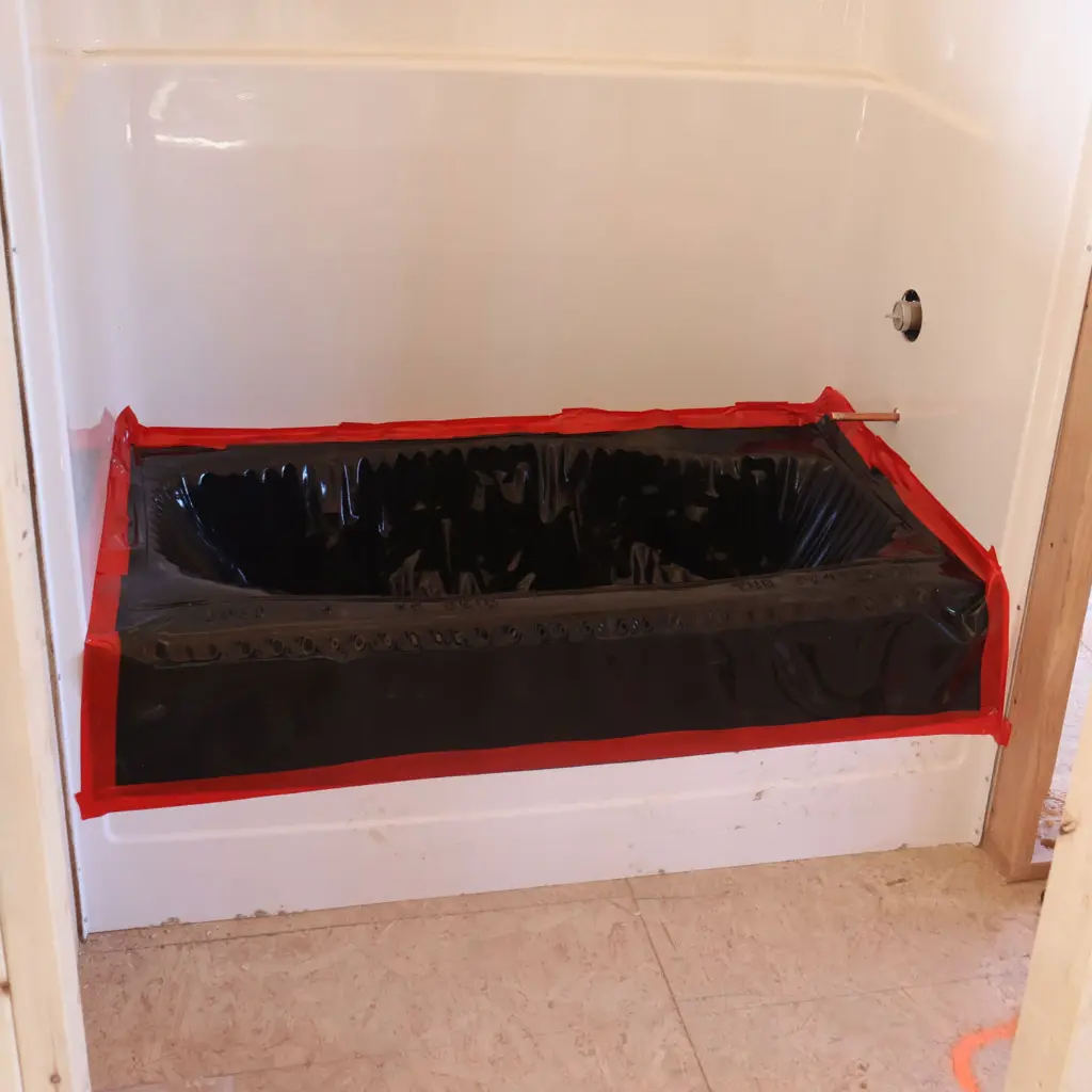 Armour-Bathtub-Protection-Liner---In-Use.webp