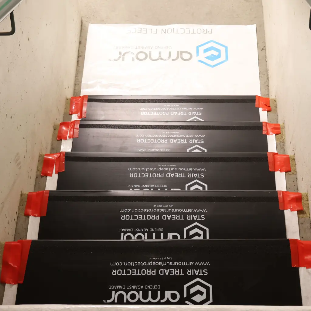 Armour-Stair-Tread-Protector-In-Use.webp