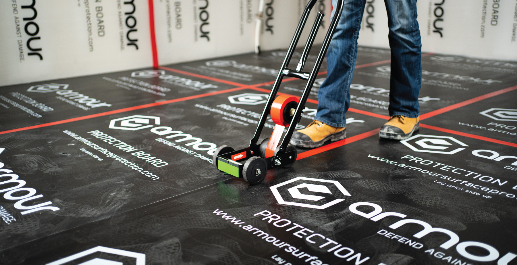 Image of Seam Tape Dispenser for jobsite surface protection installation tools blog