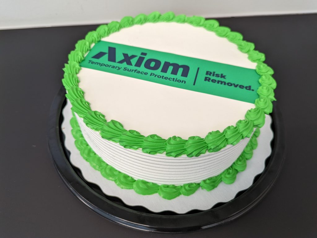 Image of new cake for Axiom temporary surface protection blog for Canada/ North America construction professionals