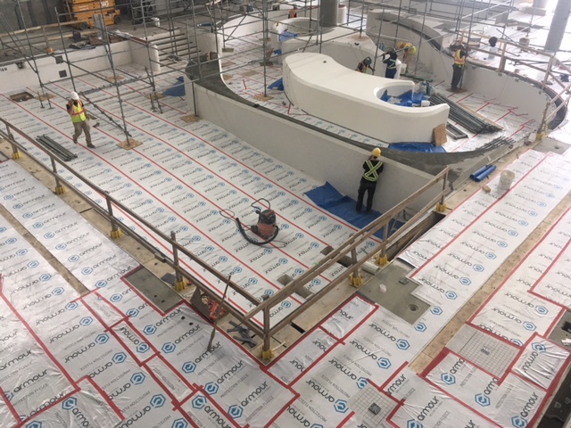 Image of Armour Protection Fleece protecting floors for Bird Construction/ Brookfield Residential YMCA at Seton case study blog by Axiom, supplier to Canada / North America construction professionals